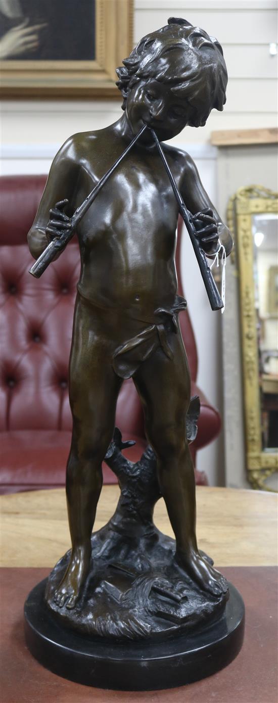 A bronze pipe player